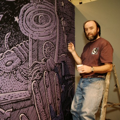 Ray painting a large Cambrian/Silurian wall graphic at the Alaska State Museum in Juneau in 1993