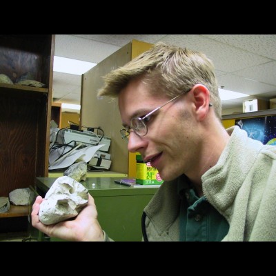 A young Leif Tapanila and a ‘boring’ fossil clam. 