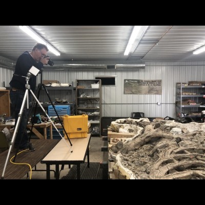 Tom Kaye scanning a T. rex skeleton at the Tate Museum in Casper, Wyoming.