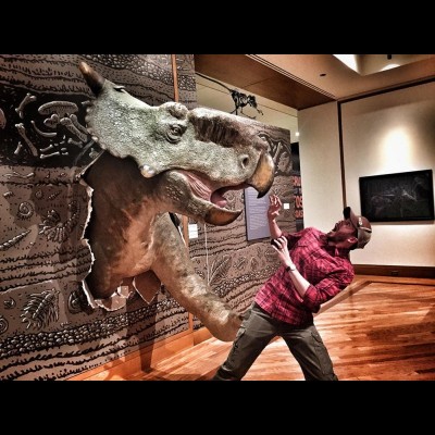 Gary's sculpture of an Alaskan Pachyrhinosaurus bursting through a museum wall for Ray's 'Fossil Coastline' exhibit.