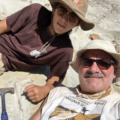 Luis with Juan Alvarez, a highschool student from Long Beach, posing with a T. rex bone in New Mexico.
&nbsp;