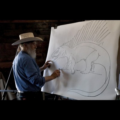 Robert Bakker is a fast and prolific sketch artist, peppering his lectures with spontaneous art. Here he considers a half-finished Dimetrodon.&nbsp; COURTESY HOUSTON MUSEUM OF NATURAL SCIENCE