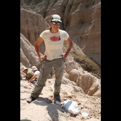 Standing proudly over a jacket containing an oreodont skull on Sheep Rock, John Day Fossil Beds National Monument