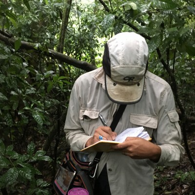 Taking notes from a study collecting modern soils in the Argentinan rain.
Photo courtesy of Melanie Connor Photography