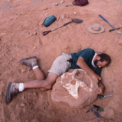 A portrait of Episode #23's Luis Chiappe at the Flaming Cliffs in the Gobi desert. Listen to his episode to find out more of Luis' work on Miocene birds.
&copy; Louie Psihoyos 1994