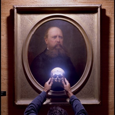 When Louie and John photographed Cope's skull in front of Marsh's portrait at Yale on f the photo lights burts into flames. And if that wasn't enough there was an eerie blue glow around Cope's skull in every frame of film they shot.
