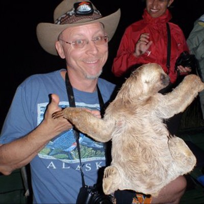 Dave being mauled in slow motion by a three-toed tree sloth on his trip to the Brazilian Amazon in 2009.