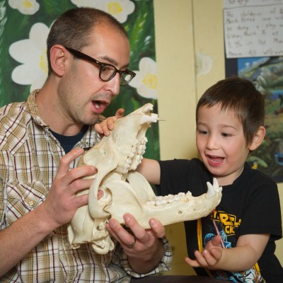 Grant's work at the Yukon Beringia Interpretive Center involves outreach AKA scaring children with fossils!