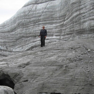 Laura chillin&rsquo; on a glacier while doing fieldwork on Bylot Island in the Canadian High Arctic. No big deal...