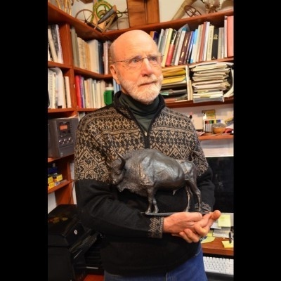 Ray's portratit of Fairbanks paleontologist Dale Guthrie with the scuplture he made of Blue Babe the steppe bison.