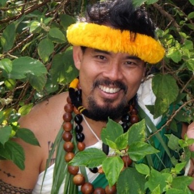Sam made his own lei hulu melemele (yellow feather lei), one symbol of Halau Mele, established by Kumu John Keola Lake. It took a month of weekends and free moments to tie individual feathers onto a core of cordage.