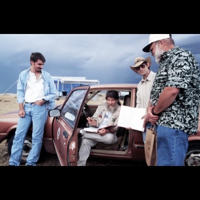 This is the very moment that Ray met Bob Bakker in 2000 at Dinopalooza, a rock concert held in an Allosaurus quarry in Wyoming. Matthew T. Mossbrucker looks on from the left.