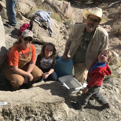 Working with her husband, John Foster, and two kids to collect a 6-foot 7-inch Brachiosaurus humerus. This is only the third Brachiosaurus humerus ever found &ndash; and the first in Utah. The humerus of Brachiosaurus is especially rare. Only two have been found in the past 120 years, and they have been collected only approximately every 60 years &ndash; the original in 1900, another around 1955, and now this one. The new one is the most complete of the three.