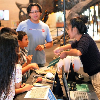 Interacting with visitors at the Museum's National Fossil Day celebration, 2014. Photo by Vanessa Rhue.