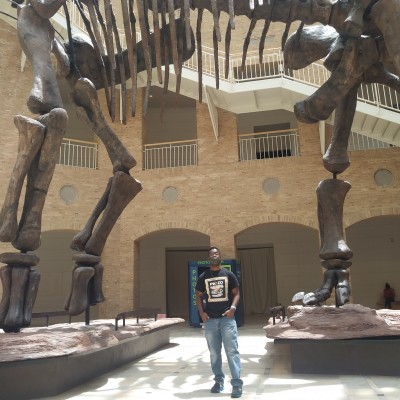 Underneath the titanosaur Argentinosaurus on display at the Fernbank Museum of Natural History in Atlanta, Georgia. Cam first visited this museum with his dad in 2007 and this museum has held a special place in his heart since then.