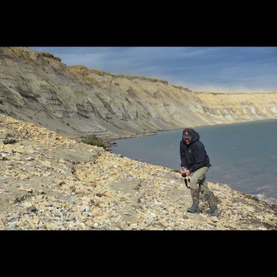 Greg waisted no time and hit the ground right away, scanning the ground for fossilized bone.