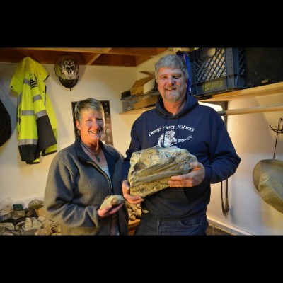 Kent and Lucy Gibson with a cast of the prehistoric marlin skull.