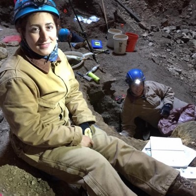 Taking a break in the cave! Jenny McGuire is in the background