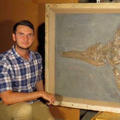 Dean with one of the new species of ichthyosaur he and Professor Judy Massare described, Ichthyosaurus somersetensis,&nbsp;At the Academy of Natural Sciences, Philadelphia. 2016.