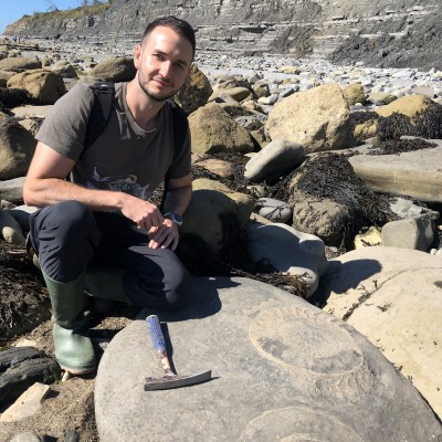 Fossil hunting on the beach along the Jurassic Coast, Dorset. 2020.