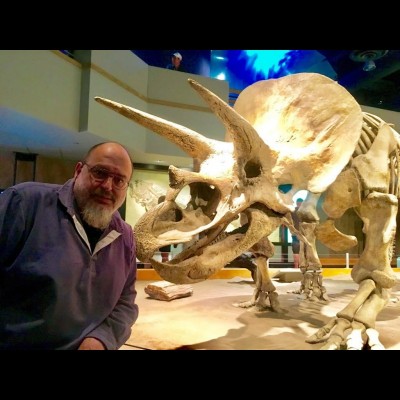 Henry Gee and a Triceratops. Pic by Kate Wong. Royal Tyrrell Museum of Palaeontology, Drumheller, Alberta, 2017.