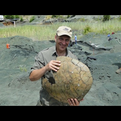 Lacovara holding Taphrophys (side-neck turtle) from the Edelman Fossil Park 