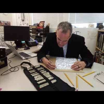 Russell Hawley hard at work, stippling away with his Pigma Micron fine art markers.