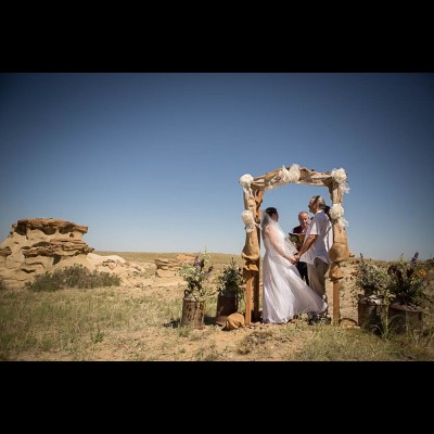 J.P. and his wife Becky were married on top of a ceratopsian skeleton still in the field in the Lance Formation of eastern Wyoming. (Photo by Dan Cepeda)