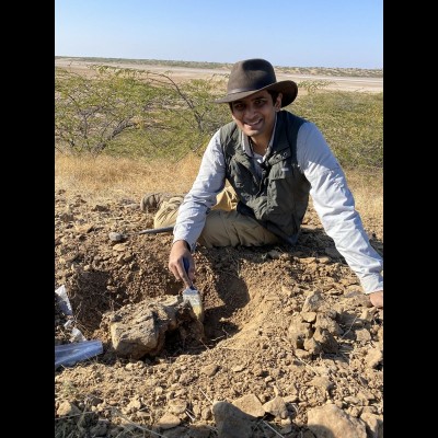 Advait in the field in India excavating dinosaurs