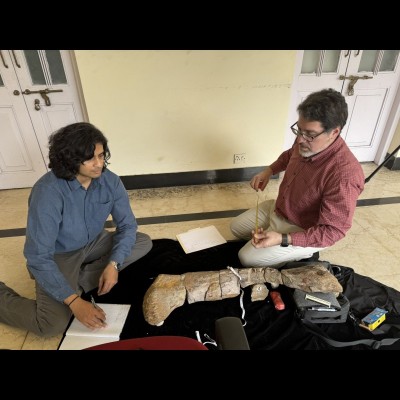 Advait Jukar studying Indian dinosaurs with Matthew Carrano of the Smithsonian Institution at the ONGC Museum, Dehradun, India