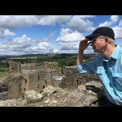 Mike Coates peering out over the castle walls.&nbsp;