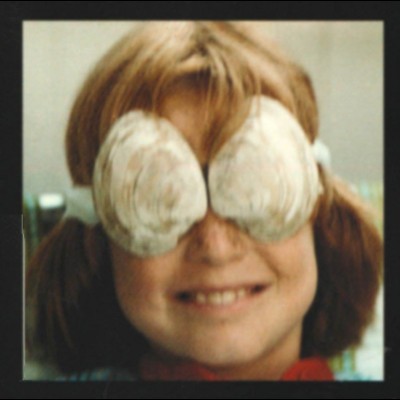 Susan at age 10 rockin' some super styling homemade quahog clam sunglasses on Cape Cod.
