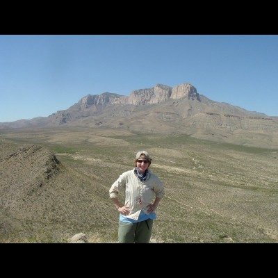 Susan in front of the permian aged Capitan Reef in the Guadalupe Mountains in west Texas.