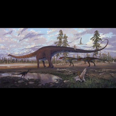 A Diplodocus is pursued by two Allosaurus in a Colorado flood plain during the late Jurassic, some 150 million years ago. An Ornitholestes looks on, while a few Rhamphorhynchus wing past.