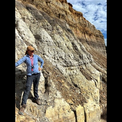 Kate measuring stratigraphic sections of the Dakota Formation along the Smokey Hill River in central KS