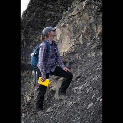Kate measuring stratigraphic section in Cretaceous depostis along the Kuskokwim River in Alaska
