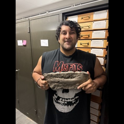 Dr. Arjan Mann holding a large jaw in the Field Museums collections of the Sarcopterygian Onychodus sigmoides.