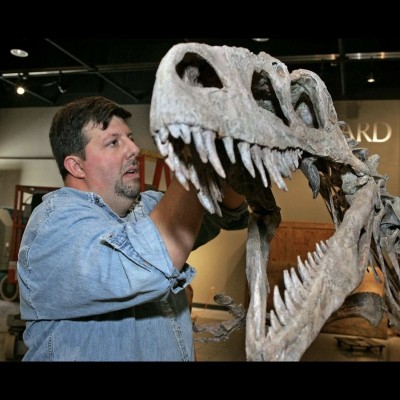 Before Scott's current job at the Museum of The Rockies, he was the Collections and Exhibits Manager at the Burpee Museum of Natural History in Rockford, Illinois. Here he is working on securing the skull of Afrovenator.
