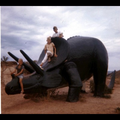 The Currie boys on a Triceratops sculpture in Rapid City, South Dakota, in 1963.