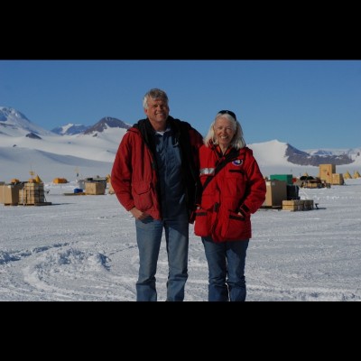Phil Currie and Eva Koppelhus at Beardmore Glacier camp in Antartica. Mount Kirkpatrick and the Cryolophosaurus quarry is the snow-capped mountain in the distance. Self-portrait, 2010.
