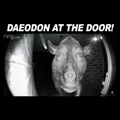 Daeodon at the Door, sometimes referred to as Cow at the Door, is a photoshopped black-and-white Ring doorbell camera image that shows a scale model of an extinct pig-like mammal called Daeodon. The image went viral in early August 2020, being circulated as a cursed image and in memes. So watch out!