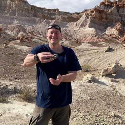 Matt Lamanna holding a megaraptorid toe bone to an unnamed species that he'd just found at Estancia Laguna Palacios in south-central Chubut Province, in central Patagonia, Argentina.
